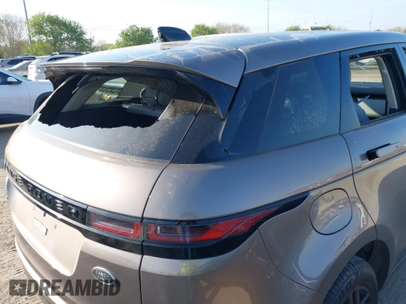 2020 Land Rover Range Rover Evoque S with VIN SALZJ2FX0LH073534, listed as a IAAI auction lot 41871038 with 91,995 mi miles and . Bid and sale history available at DreamBid. Image 17.