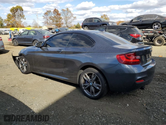 2015 BMW 2 Series M235i xDrive with VIN WBA1J9C5XFV370961, listed as a Copart auction lot 78313054 with 99,245 mi miles and Salvage Title. Bid and sale history available at carsss.com. Image 2.