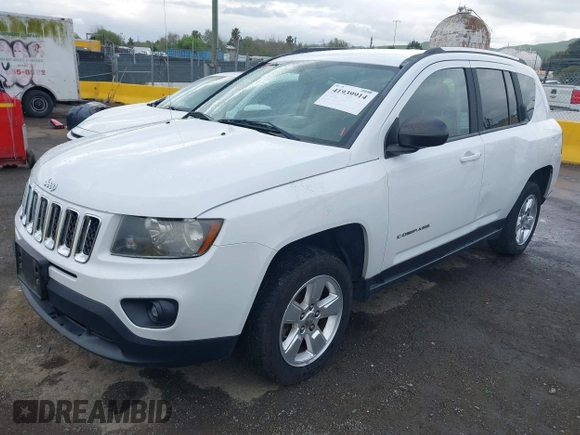 2014 Jeep Compass Altitude with VIN 1C4NJCBA8ED606589, listed as a IAAI auction lot 41939914 with 148,281 mi miles. Bid and sale history available at carsss.com. Image 2.