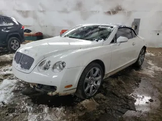 2007 Bentley Continental GT with VIN SCBDR33W27C049849, listed as a Copart auction lot 79959404 with 104,154 mi miles and Clean title. Bid and sale history available at DreamBid. Image 1.