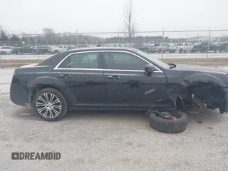 2013 Chrysler 300 with VIN 2C3CCABT7DH652797, listed as a IAAI auction lot 41602405 with 203,920 mi miles. Bid and sale history available at carsss.com. Image 13.