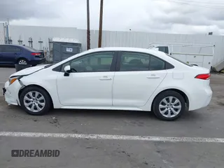 2023 Toyota Corolla Hybrid LE with VIN JTDBCMFE3PJ010097, listed as a IAAI auction lot 41786656 with 50,775 mi miles. Bid and sale history available at carsss.com. Image 14.