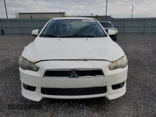 2009 Mitsubishi Lancer ES with VIN JA3AU26U19U610721, listed as a Copart auction lot 69601814 with 282,063 mi miles and Clean Title. Bid and sale history available at carsss.com. Image 5.