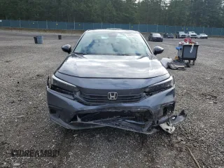 2023 Honda Civic Sedan Sport with VIN 2HGFE2F52PH517298, listed as a Copart auction lot 51676335 with 21,427 mi miles and Salvage Title. Bid and sale history available at carsss.com. Image 5.
