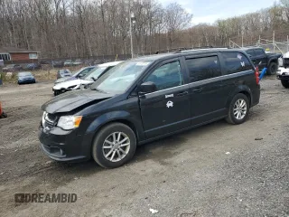 2018 Dodge Grand Caravan SXT with VIN 2C4RDGCG7JR307363, listed as a Copart auction lot 51110115 with 124,812 mi miles and Salvage Title. Bid and sale history available at DreamBid. Image 1.