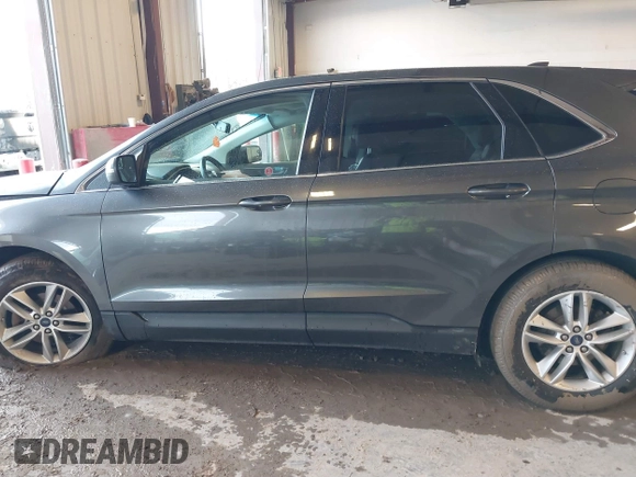 2015 Ford Edge SEL with VIN 2FMTK3J80FBB24088, listed as a IAAI auction lot 41724786 with 101,066 mi miles. Bid and sale history available at carsss.com. Image 14.