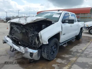 2017 Chevrolet Silverado 1500 LT with VIN 3GCPCREC6HG311064, listed as a IAAI auction lot 42026646 with 242,195 mi miles and . Bid and sale history available at DreamBid. Image 18.