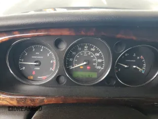 2004 Jaguar XJ с VIN SAJEA73B24TG10774, выставлен на аукционе Copart как лот 72577604 с пробегом 217 846 миль миль и Чистый • Clean title. История ставок и продаж доступна на DreamBid. Изображение 9.