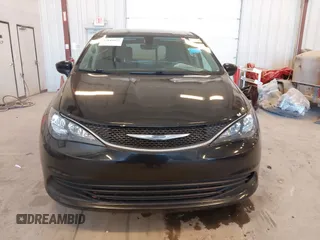 2017 Chrysler Pacifica Touring with VIN 2C4RC1DG3HR571477, listed as a IAAI auction lot 42040872 with 112,028 mi miles and . Bid and sale history available at DreamBid. Image 12.