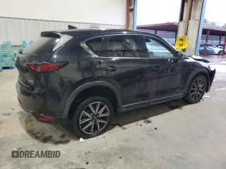 2018 Mazda CX-5 Grand Touring with VIN JM3KFADM3J0325843, listed as a Copart auction lot 87958375 with 93,577 mi miles and Salvage title. Bid and sale history available at DreamBid. Image 3.
