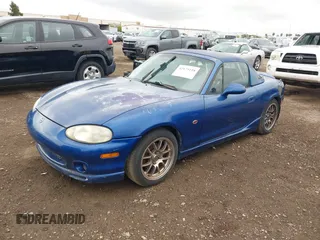 1999 Mazda MX-5 Miata z VIN JM1NB3539X0130910, wystawiony jako IAAI lot #42175118 z przebiegiem 91 570 mil mil oraz . Historia ofert i sprzedaży dostępna na DreamBid. Obrazek 2.