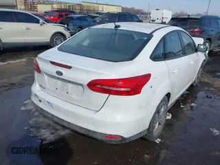 2018 Ford Focus SE with VIN 1FADP3FE0JL282325, listed as a IAAI auction lot 41635979 with 44,295 mi miles. Bid and sale history available at carsss.com. Image 4.