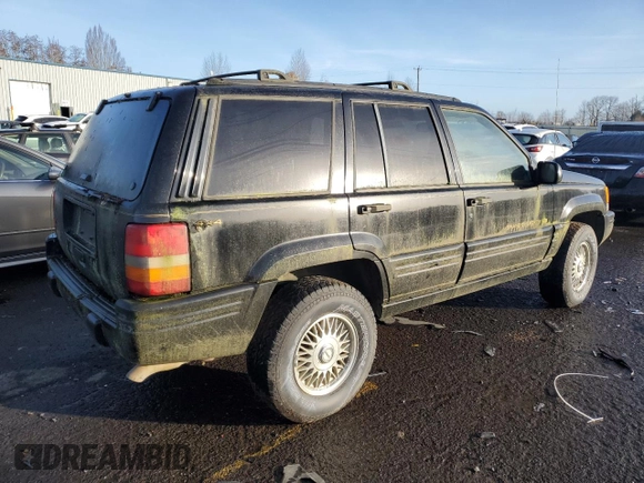 1998 Jeep Grand Cherokee Limited with VIN 1J4GZ78S0WC138917, listed as a Copart auction lot 86223974 with 152,482 mi miles and Clean title. Bid and sale history available at DreamBid. Image 3.