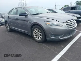 2013 Ford Taurus SE z VIN 1FAHP2D88DG189039, wystawiony jako IAAI lot #42280528 z przebiegiem 118 985 mil mil oraz . Historia ofert i sprzedaży dostępna na DreamBid. Obrazek 1.