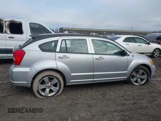 2010 Dodge Caliber SXT z VIN 1B3CB4HA0AD575917, wystawiony jako IAAI lot #41709405 z przebiegiem 213 641 mil mil oraz . Historia ofert i sprzedaży dostępna na DreamBid. Obrazek 13.
