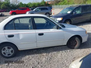 2002 Hyundai Accent GL with VIN KMHCG45C92U347708, listed as a IAAI auction lot 42137086 with 73,271 mi miles. Bid and sale history available at carsss.com. Image 6.