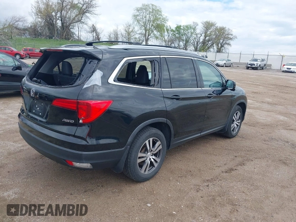 2017 Honda Pilot EX-L with VIN 5FNYF6H51HB045854, listed as a IAAI auction lot 42178053 with 114,913 mi miles and . Bid and sale history available at DreamBid. Image 4.