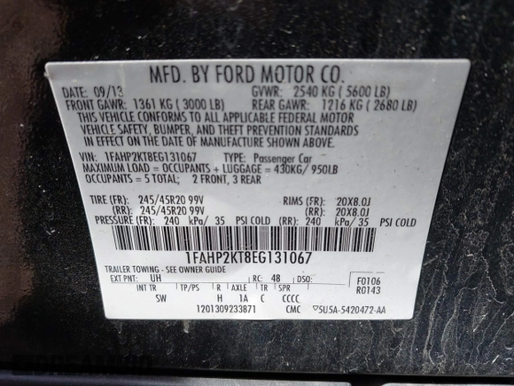 2014 Ford Taurus SHO with VIN 1FAHP2KT8EG131067, listed as a IAAI auction lot 42102086 with 107,822 mi miles. Bid and sale history available at carsss.com. Image 9.