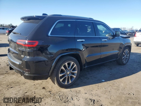 2017 Jeep Grand Cherokee Overland with VIN 1C4RJFCT7HC684746, listed as a Copart auction lot 83259314 with 106,848 mi miles and Salvage Title. Bid and sale history available at carsss.com. Image 3.