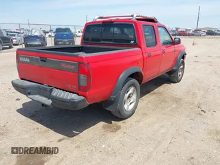 2000 Nissan Frontier XE z VIN 1N6ED27T5YC355209, wystawiony jako IAAI lot #42397674 z przebiegiem 198 278 mil mil oraz . Historia ofert i sprzedaży dostępna na DreamBid. Obrazek 4.