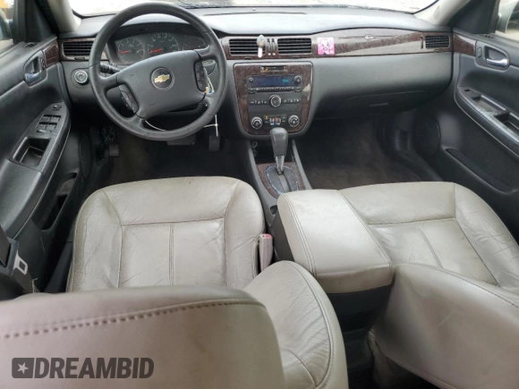 2014 Chevrolet Impala LT with VIN 2G1WB5E33E1165713, listed as a Copart auction lot 60591585 with 203,323 mi miles and Salvage title. Bid and sale history available at DreamBid. Image 8.
