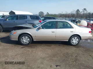 2001 Toyota Camry CE with VIN 4T1BG22K71U027796, listed as a IAAI auction lot 41749025 with 167,917 mi miles and . Bid and sale history available at DreamBid. Image 14.