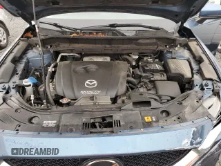 2017 Mazda CX-5 Touring with VIN JM3KFBCLXH0124451, listed as a Copart auction lot 51060275 with 126,807 mi miles and Salvage Title. Bid and sale history available at carsss.com. Image 12.