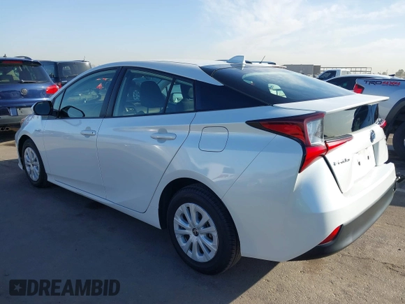 2021 Toyota Prius L Eco with VIN JTDKAMFU7M3133544, listed as a IAAI auction lot 41548653 with 115,214 mi miles and . Bid and sale history available at DreamBid. Image 3.