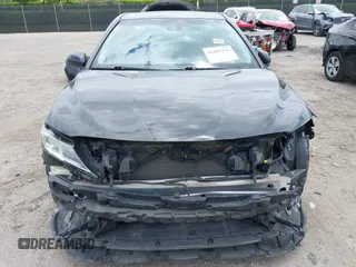 2018 Toyota Camry LE z VIN 4T1B11HK6JU158382, wystawiony jako IAAI lot #42185532 z przebiegiem 94 802 mil mil oraz . Historia ofert i sprzedaży dostępna na DreamBid. Obrazek 13.