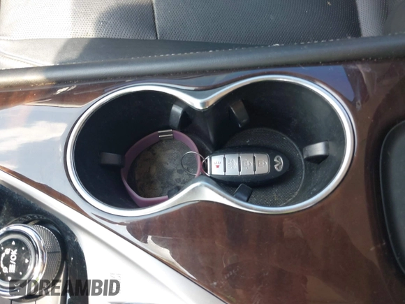 2015 Infiniti Q50 Premium with VIN JN1BV7AR8FM391645, listed as a IAAI auction lot 42158770 with 54,490 mi miles. Bid and sale history available at carsss.com. Image 11.