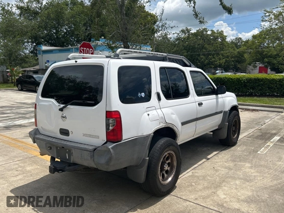 2003 Nissan Xterra SE with VIN 5N1ED28T33C685064, listed as a Copart auction lot 60668505 with 227,211 mi miles and Clean title. Bid and sale history available at DreamBid. Image 4.