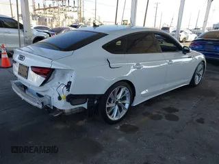 2023 Audi A5 Sportback Premium z VIN WAUABCF5XPA056452, wystawiony jako IAAI lot #41644537 z przebiegiem 14 918 mil mil oraz . Historia ofert i sprzedaży dostępna na DreamBid. Obrazek 4.