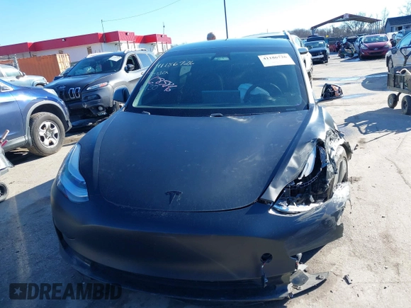 2020 Tesla Model 3 Standard Range Plus with VIN 5YJ3E1EA4LF745491, listed as a IAAI auction lot 41186726 with 74,575 mi miles and . Bid and sale history available at DreamBid. Image 12.