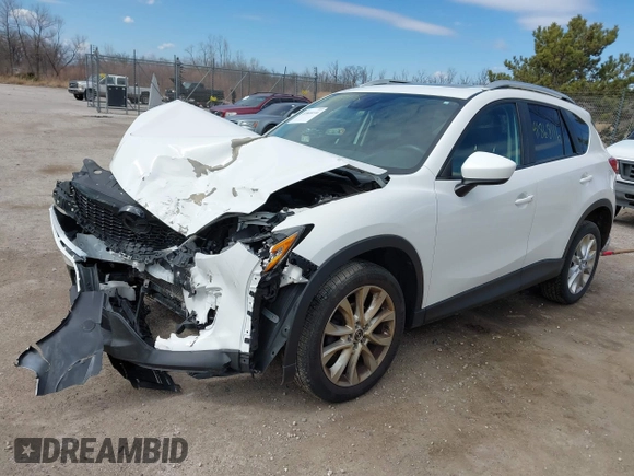 2014 Mazda CX-5 Grand Touring with VIN JM3KE4DY8E0397330, listed as a IAAI auction lot 41868116 with 180,891 mi miles. Bid and sale history available at carsss.com. Image 18.