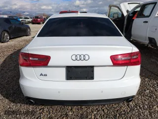 2014 Audi A6 2.0T Premium Plus with VIN WAUGFAFC1EN049090, listed as a Copart auction lot 45419945 with 154,062 mi miles and Salvage Title. Bid and sale history available at carsss.com. Image 6.