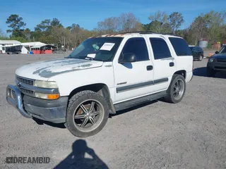 2003 Chevrolet Tahoe LS with VIN 1GNEC13V23J329623, listed as a IAAI auction lot 41885652 with 277,112 mi miles. Bid and sale history available at carsss.com. Image 2.
