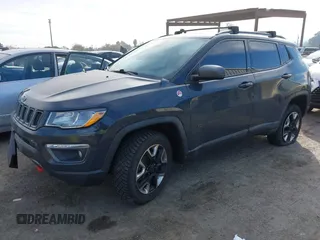 2017 Jeep Compass Trailhawk with VIN 3C4NJDDBXHT657425, listed as a IAAI auction lot 41022289 with 83,003 mi miles and . Bid and sale history available at DreamBid. Image 17.
