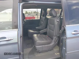 2007 Honda Odyssey EX-L z VIN 5FNRL38757B121989, wystawiony jako IAAI lot #42323131 z przebiegiem 174 906 mil mil oraz . Historia ofert i sprzedaży dostępna na DreamBid. Obrazek 8.