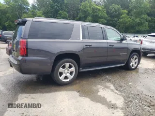 2016 Chevrolet Suburban LT with VIN 1GNSCHKC3GR312221, listed as a Copart auction lot 57445934 with 157,958 mi miles and Salvage Title. Bid and sale history available at carsss.com. Image 3.