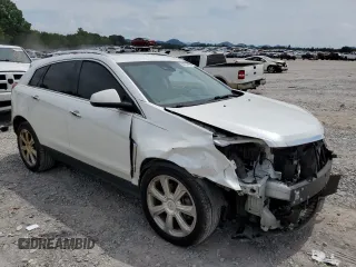 2014 Cadillac SRX Premium Collection z VIN 3GYFNDE37ES652548, wystawiony jako Copart lot #65895833 z przebiegiem 151 653 mil mil oraz Szkoda całkowita • Salvage title. Historia ofert i sprzedaży dostępna na DreamBid. Obrazek 4.