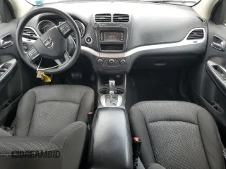 2017 Dodge Journey SXT with VIN 3C4PDDBG0HT542623, listed as a Copart auction lot 61628385 with 130,285 mi miles and Salvage title. Bid and sale history available at DreamBid. Image 8.