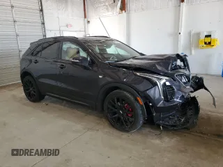 2023 Cadillac XT4 AWD Sport z VIN 1GYFZFR41PF103650, wystawiony jako Copart lot #59321355 z przebiegiem 27 092 mil mil oraz Szkoda całkowita • Salvage title. Historia ofert i sprzedaży dostępna na DreamBid. Obrazek 4.