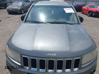 2011 Jeep Compass Latitude with VIN 1J4NT1FB4BD246549, listed as a IAAI auction lot 42156761 with 232,739 mi miles. Bid and sale history available at carsss.com. Image 6.