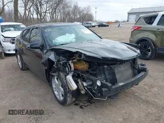 2013 Dodge Avenger SXT with VIN 1C3CDZCG5DN741112, listed as a IAAI auction lot 41838733 with 179,000 mi miles and . Bid and sale history available at carsss.com. Image 1.