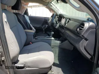 2020 Toyota Tacoma SR z VIN 3TYSZ5AN9LT004270, wystawiony jako Copart lot #55217195 z przebiegiem Nie podano mil oraz Szkoda całkowita • Salvage title. Historia ofert i sprzedaży dostępna na DreamBid. Obrazek 7.