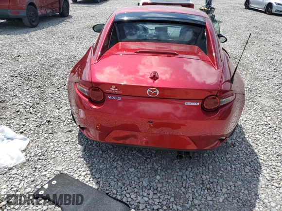 2020 Mazda MX-5 Miata Grand Touring z VIN JM1NDAM70L0414102, wystawiony jako Copart lot #55261575 z przebiegiem 70 157 mil mil oraz Szkoda całkowita • Salvage title. Historia ofert i sprzedaży dostępna na DreamBid. Obrazek 6.