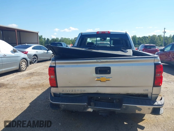 2015 Chevrolet Silverado 1500 LTZ with VIN 3GCUKSEC6FG510061, listed as a IAAI auction lot 40384385 with 156,882 mi miles. Bid and sale history available at carsss.com. Image 16.