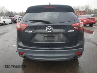 2016 Mazda CX-5 Grand Touring with VIN JM3KE4DYXG0711367, listed as a Copart auction lot 52862405 with 87,870 mi miles and Salvage Title. Bid and sale history available at DreamBid. Image 6.