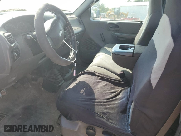 2003 Ford F-150 XL с VIN 1FTRF18213NB70120, выставлен на аукционе Copart как лот 72227114 с пробегом Не указан миль и Чистый • Clean title. История ставок и продаж доступна на DreamBid. Изображение 7.