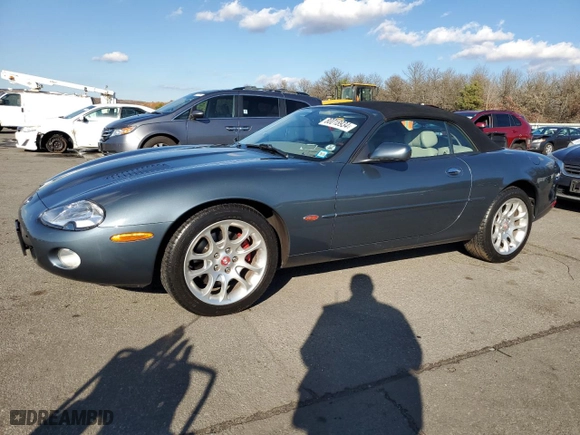 2001 Jaguar XK8 with VIN SAJDA42B91PA15291, listed as a Copart auction lot 80018934 with 68,009 mi miles and Salvage Title. Bid and sale history available at carsss.com. Image 1.